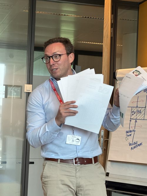 Participant presenting his negotiation preparation to the group